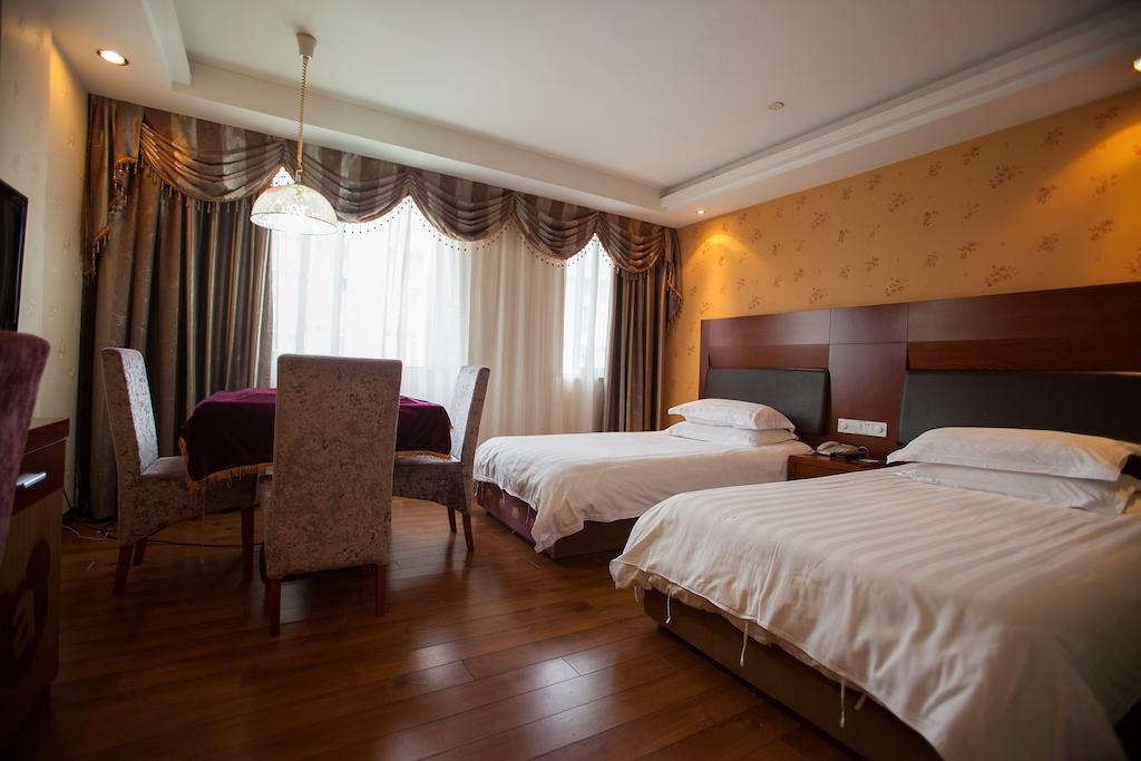 Yiwu Luckbear Hotel Quarto foto