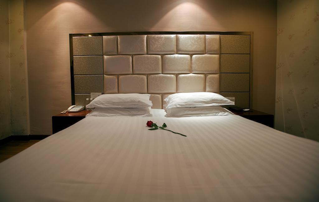 Yiwu Luckbear Hotel Quarto foto