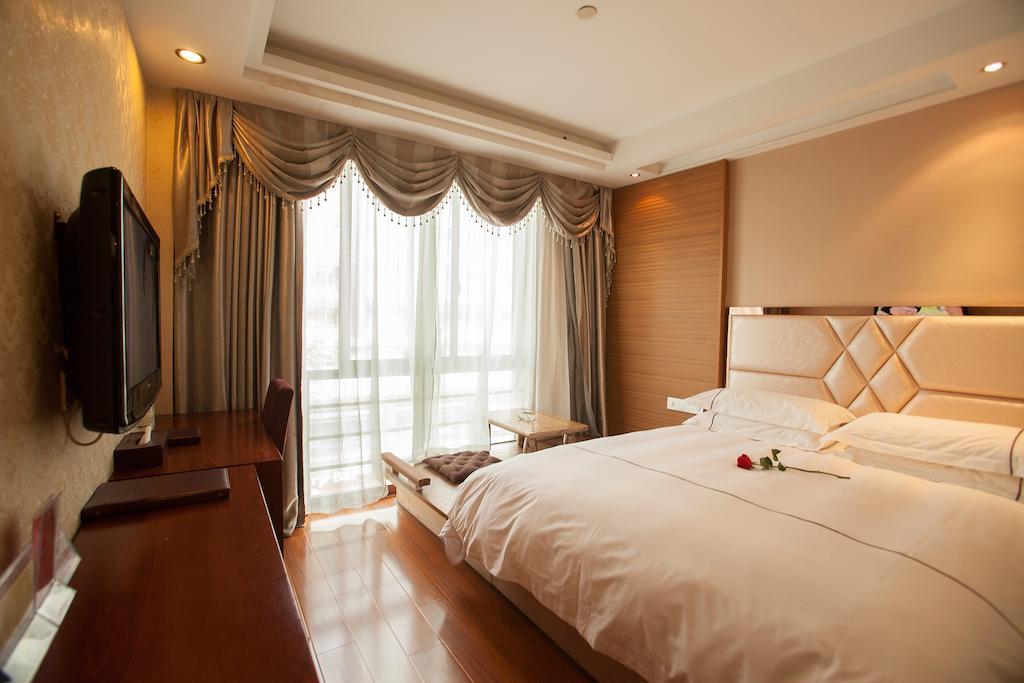 Yiwu Luckbear Hotel Quarto foto